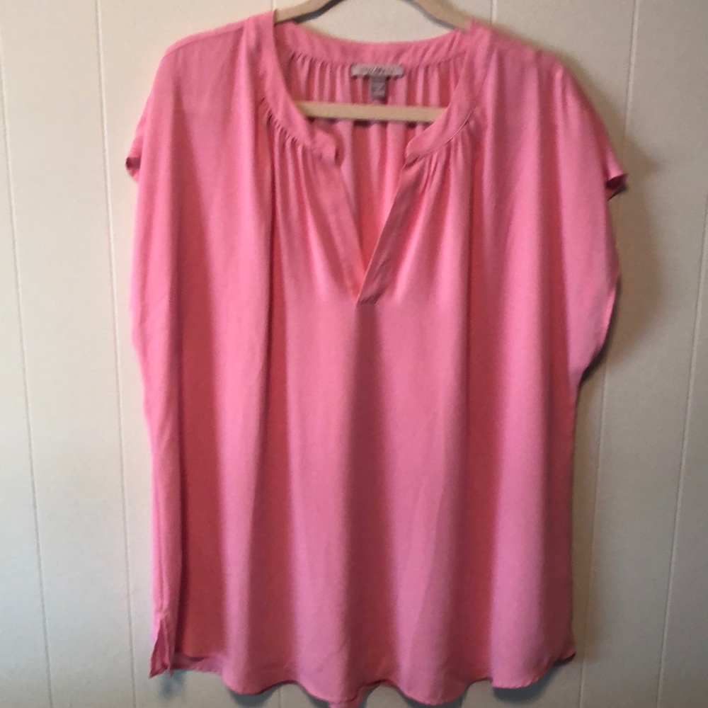 Sleeveless pink blouse